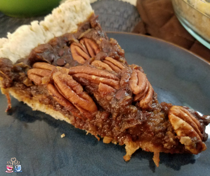 Vegan Pecan Pie is something you CAN make and enjoy! This version includes chocolate and coconut with a rich Medjool date base! Check out our recipe!