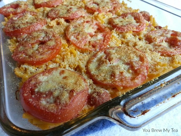 Baked Mac 'n Cheese is a classic, but adding in this kid-friendly twist of hot dogs, tomatoes and a bit of extra cheese on top turns it into a meal everyone will love - including mom!