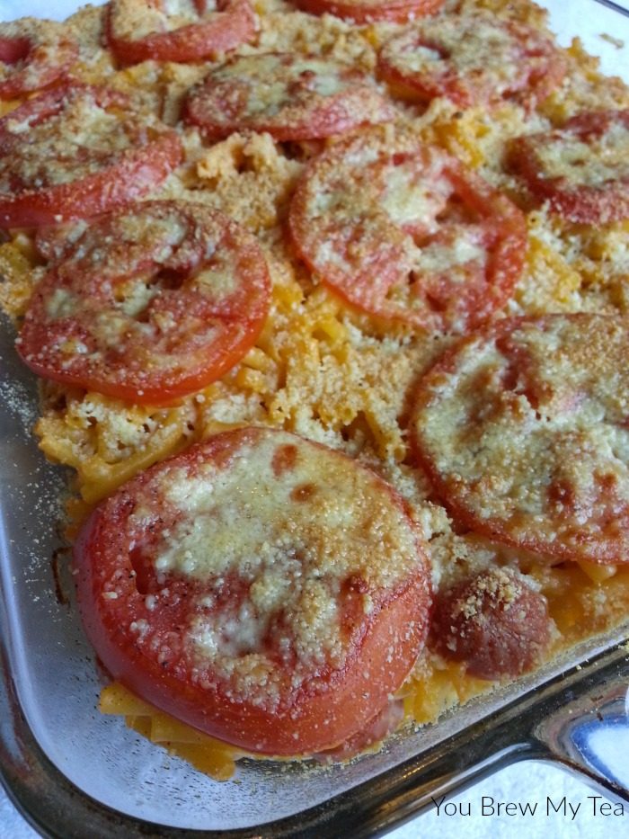 Baked Mac 'n Cheese is a classic, but adding in this kid-friendly twist of hot dogs, tomatoes and a bit of extra cheese on top turns it into a meal everyone will love - including mom!