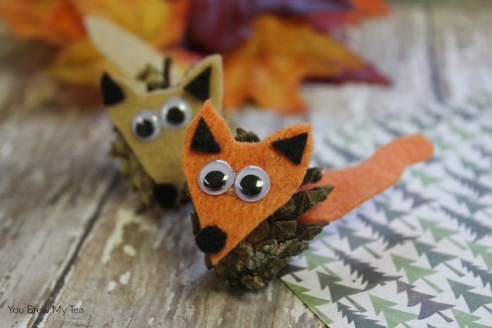 Fall Arts And Crafts for kids like this simple pinecone critters project are great for homeschool crafts and fun fall decor!