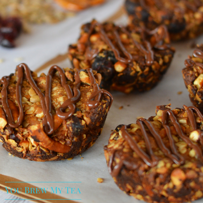 Granola Bar Recipes aren't boring anymore! Make our Chocolate Drizzled Granola Bar Rounds included sunflowers, chocolate, peanut butter, & cranberries!