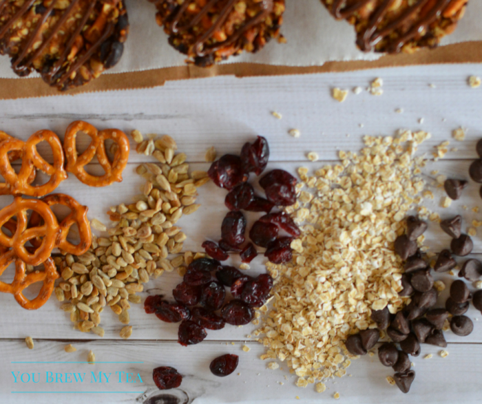 Granola Bar Recipes aren't boring anymore! Make our Chocolate Drizzled Granola Bar Rounds included sunflowers, chocolate, peanut butter, & cranberries!