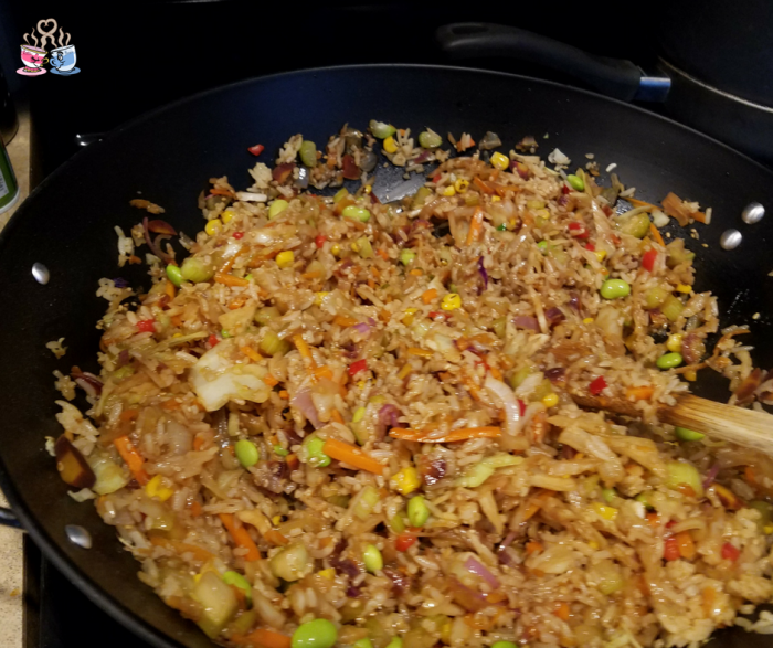 You'll love these Vegan Fried Rice Stuffed Homemade Egg Rolls! They are semi-homemade so come together fast, and full of flavor! Plus only 3 SmartPoints!