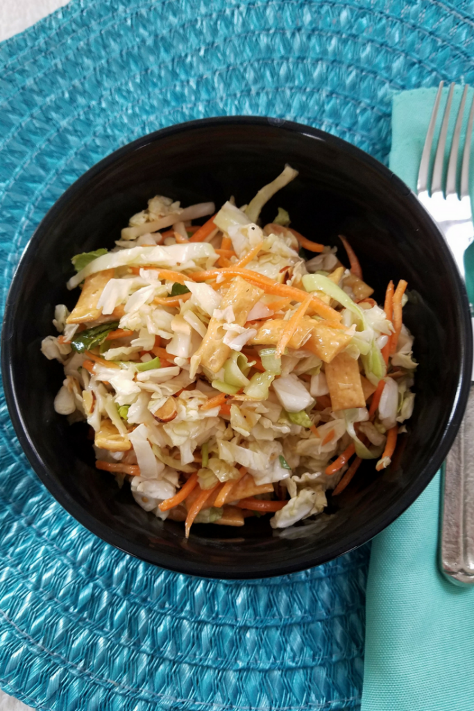 Make this Asian Salad Recipe in minutes! So delicious with a homemade sesame ginger dressing that tops this salad perfectly! Low point FreeStyle Weight Watchers Recipe!!! 