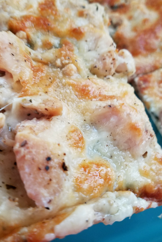 Make our Weight Watchers FreeStyle Recipe for Skinny Chicken Alfredo Pizza! This is so easy, delicious, and kid-friendly! A perfect Weight Watchers pizza recipe!