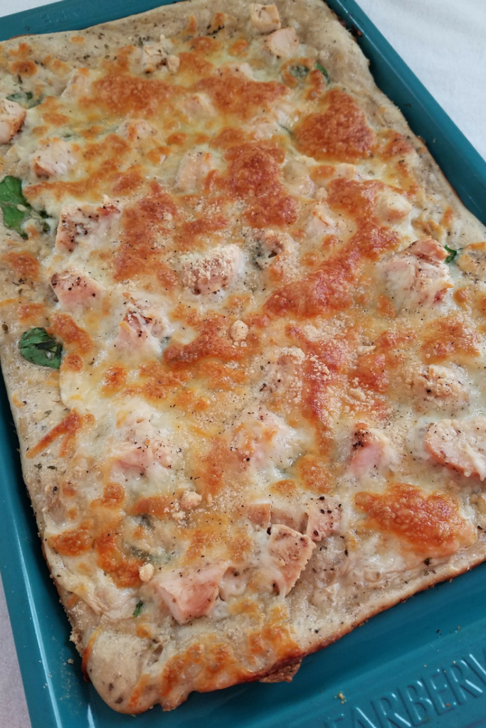 Make our Weight Watchers FreeStyle Recipe for Skinny Chicken Alfredo Pizza! This is so easy, delicious, and kid-friendly! A perfect Weight Watchers pizza recipe!