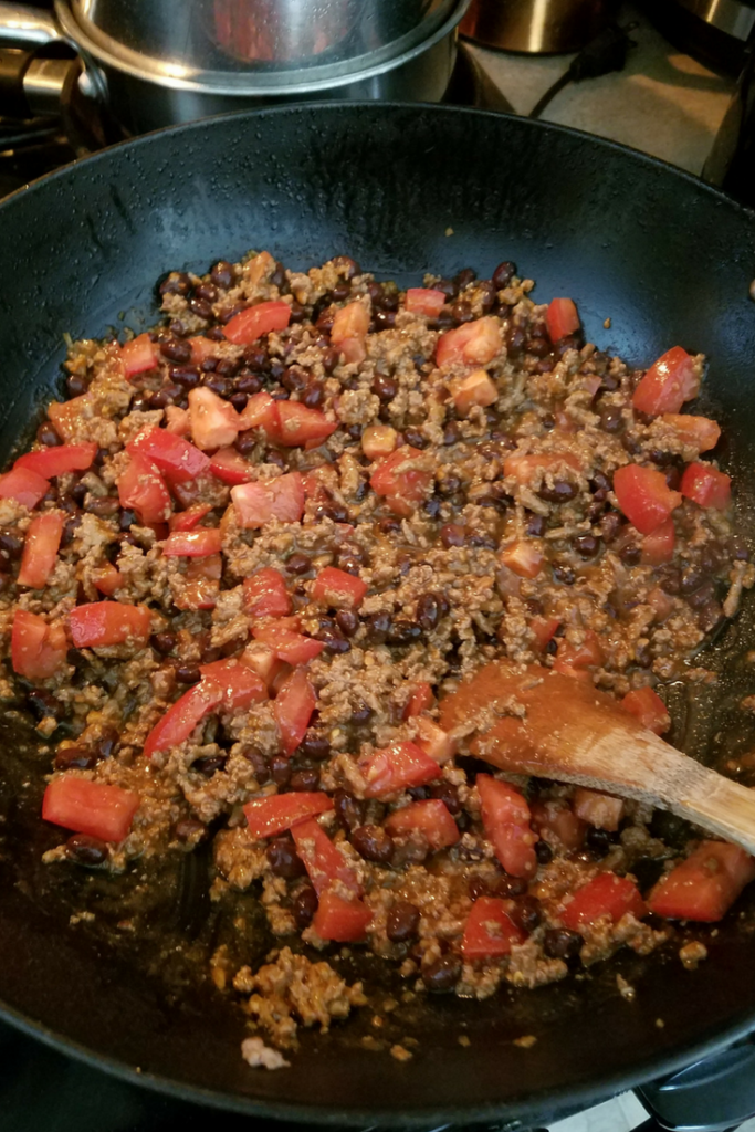 Make our Skinny Cheesy Taco Pasta dish for your family for only 6 SmartPoints on the Weight Watchers FreeStyle Plan! A great easy meal that the whole family loves and is ready in under 30 minutes!