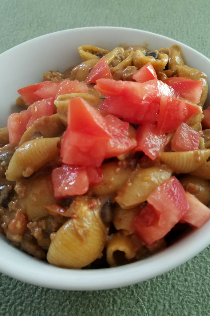 Make our Skinny Cheesy Taco Pasta dish for your family for only 6 SmartPoints on the Weight Watchers FreeStyle Plan! A great easy meal that the whole family loves and is ready in under 30 minutes!