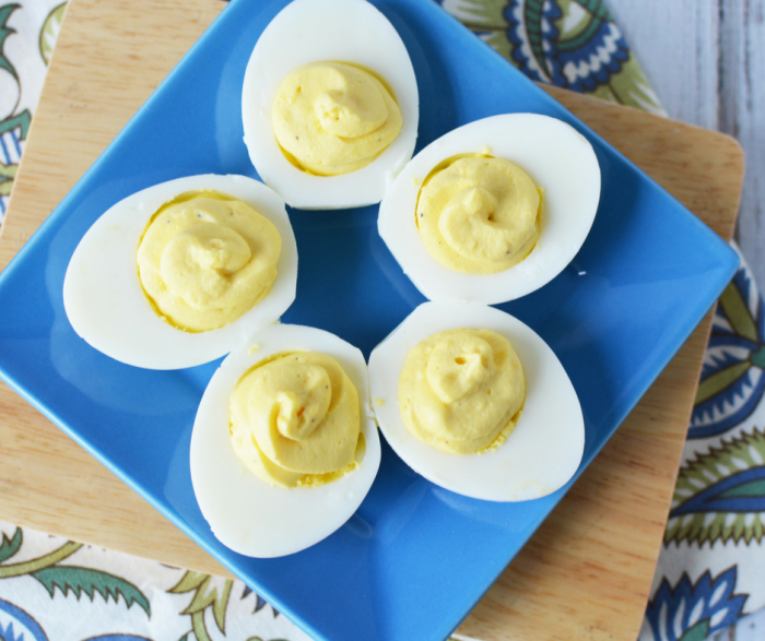 Our easy Weight Watchers Deviled Eggs Recipe is only 1 SmartPoint on FreeStyle for each egg! A perfect easy summer recipe everyone will love to enjoy with you at your next barbecue event!