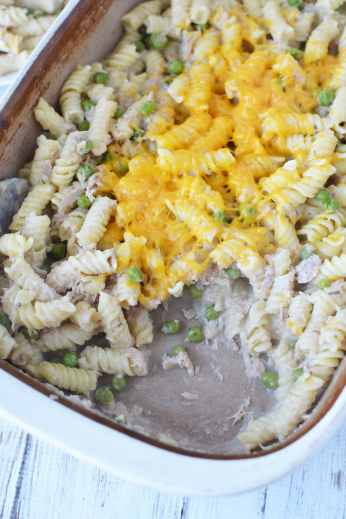 Close up overhead shot of tuna noodle casserole with a scoop taken out