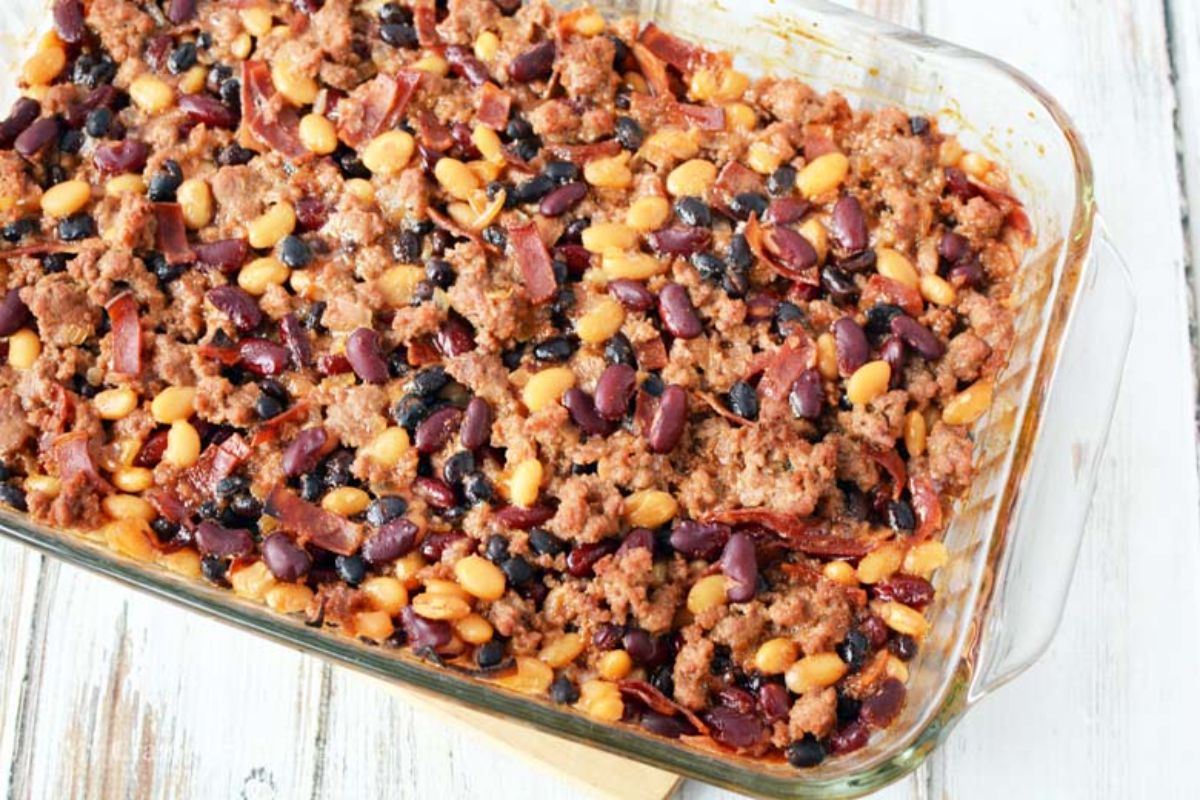 glass baking dish of baked beans