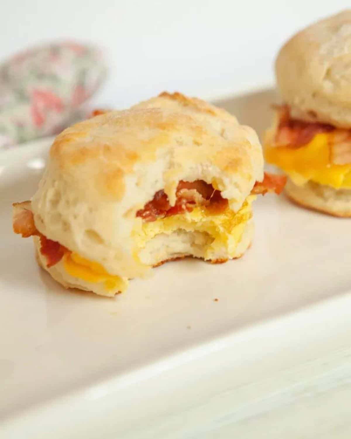 biscuit breakfast sandwich on white plate