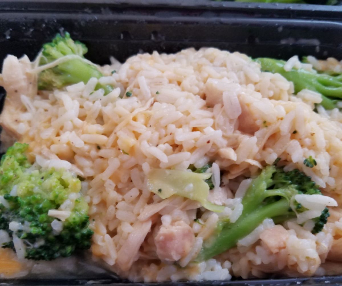 rice and broccoli in black bowl